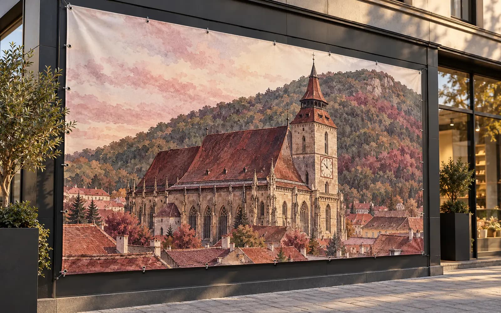 Banner cu ilustrația reperului Biserica Neagră și Tâmpa, pe o fațadă de magazin — reper al județului Brașov, livrare în Codlea